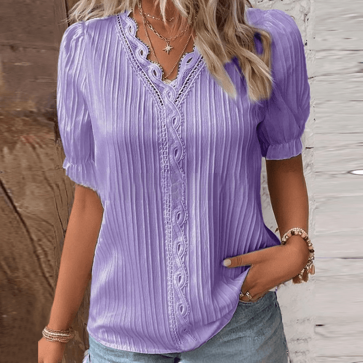 Elegante Bluse mit Spitzenakzent und V-Ausschnitt