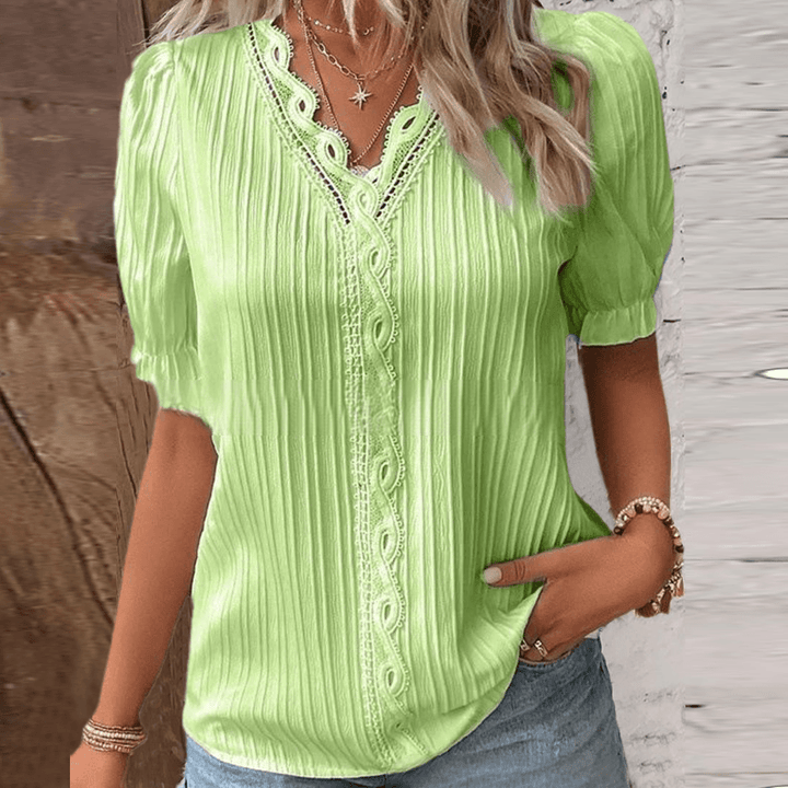 Elegante Bluse mit Spitzenakzent und V-Ausschnitt